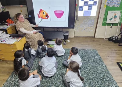 Ms Amelia teaching InitiaLit to Kindergarten Students